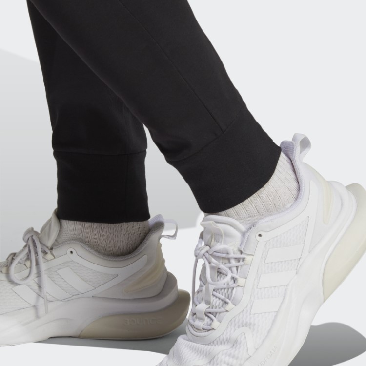 Calça De Punho Cônico De Jérsei único Essencial Adidas Preta