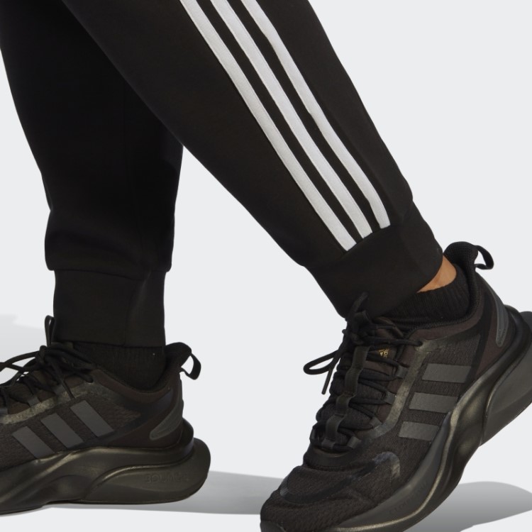Calças Regulares Com As Três Listras Pretas E Elegantes Da Adidas Future Icons