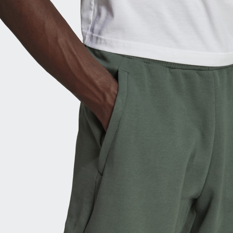 Emblema De Lã Reciclada De Estádio De óxido Verde De Shorts Esportivos Adidas