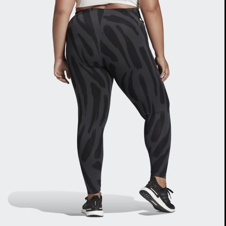 Os ícones Futuros Multicoloridos Da Adidas Sentem Leggings Gráficas Ferozes