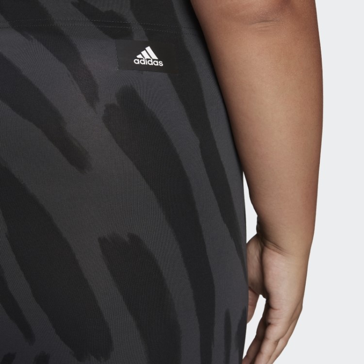 Os ícones Futuros Multicoloridos Da Adidas Sentem Leggings Gráficas Ferozes
