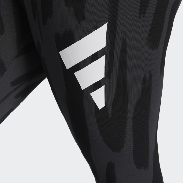 Os ícones Futuros Multicoloridos Da Adidas Sentem Leggings Gráficas Ferozes