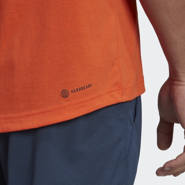 Camiseta Adidas Laranja Projetada Para Mover O Logotipo