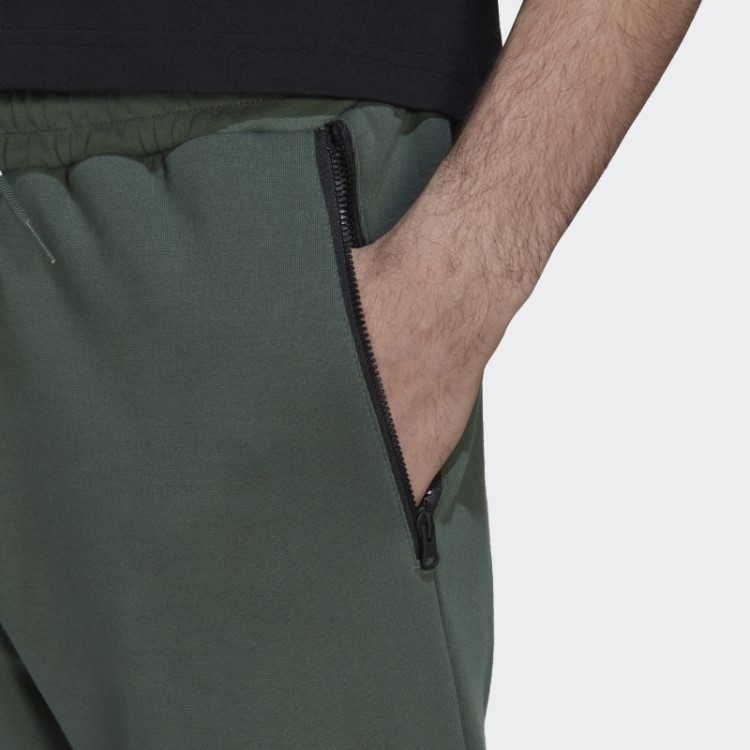 Future Icons Calça Com As Três Listras Green Oxid Adidas