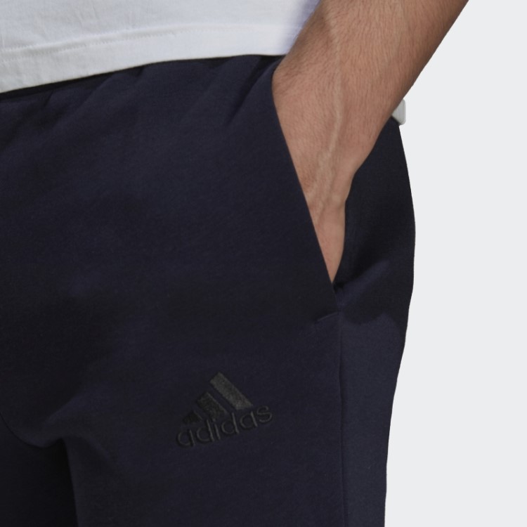 Calça De Logo Com Punho Afunilado De Lã Essencial Adidas