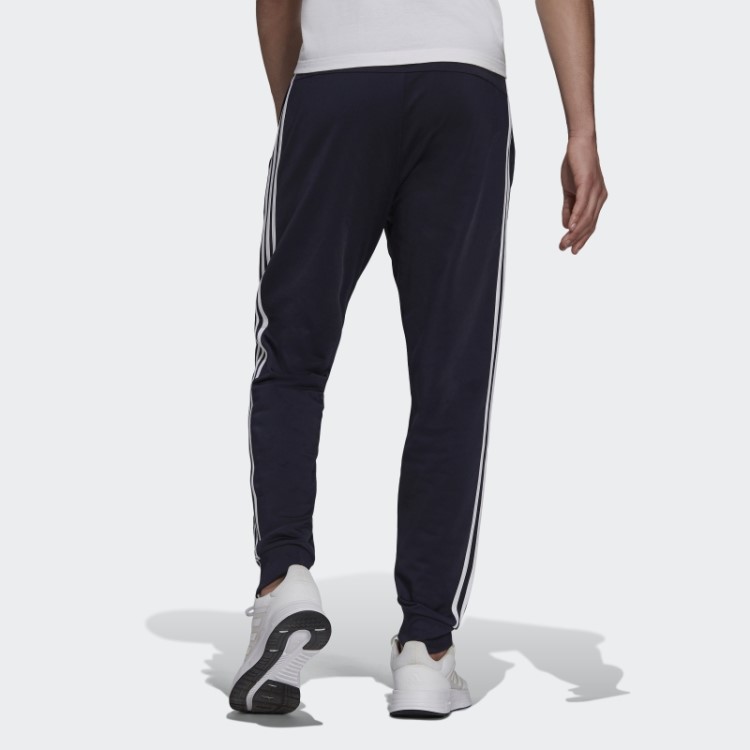 Calça Esportiva Com As Três Listras Adidas Essentials Warm Up Ink