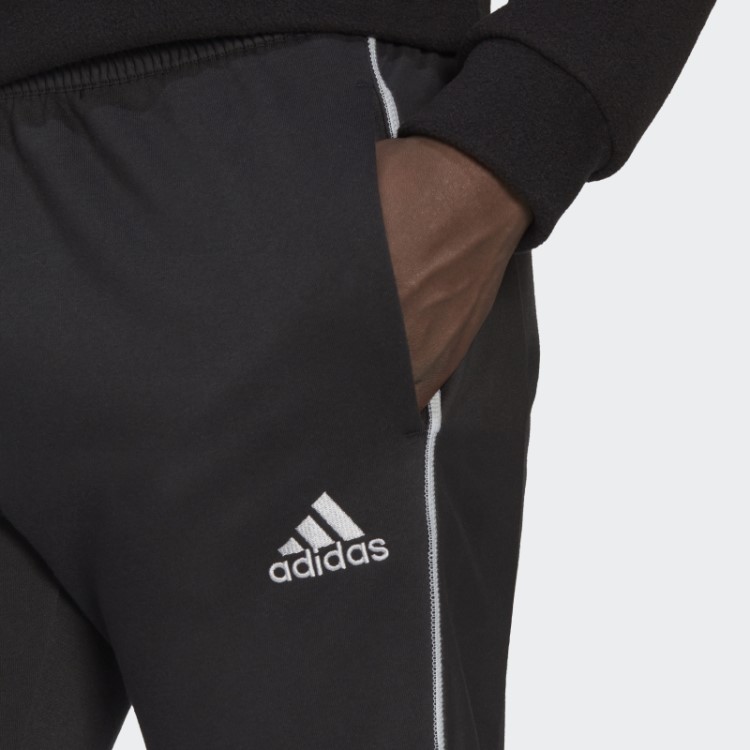 Calça De Lã Preta Adidas Essentials Refletida No Escuro