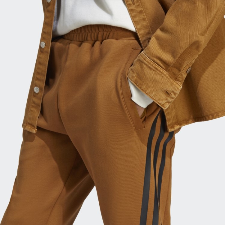 Calça Adidas Future Icons Com As Três Listras Bronze