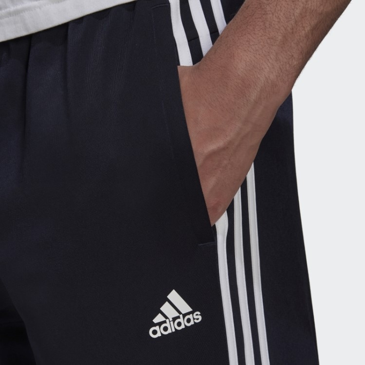 Calça Esportiva Com As Três Listras Adidas Ink Primegreen Essentials E Bainha Aberta